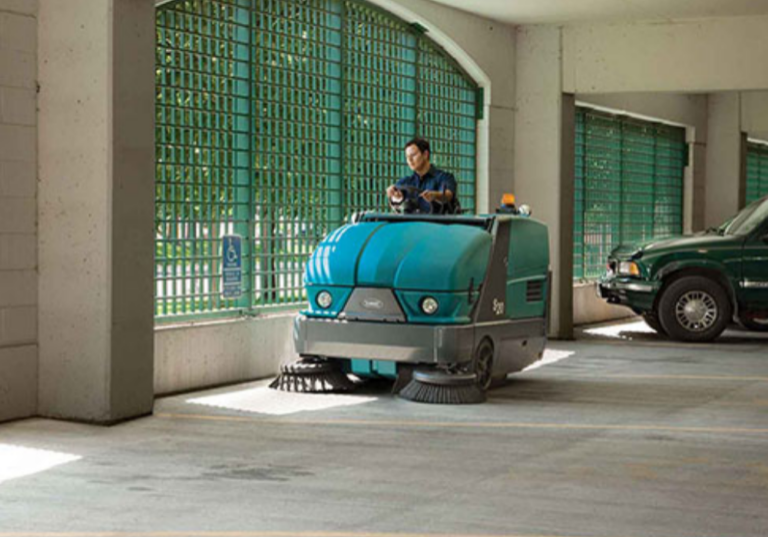 Sweeping machine maintenance - sweeping a car park