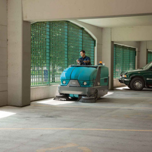 Sweeping machine maintenance - sweeping a car park